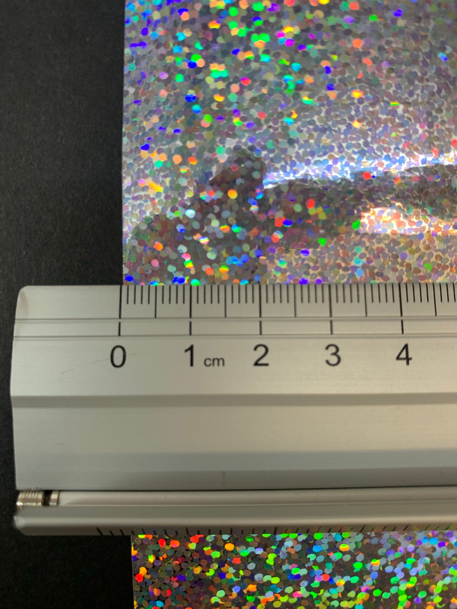 Vinilo adhesivo holográfico con lentejuelas plateadas Encore® EFX21